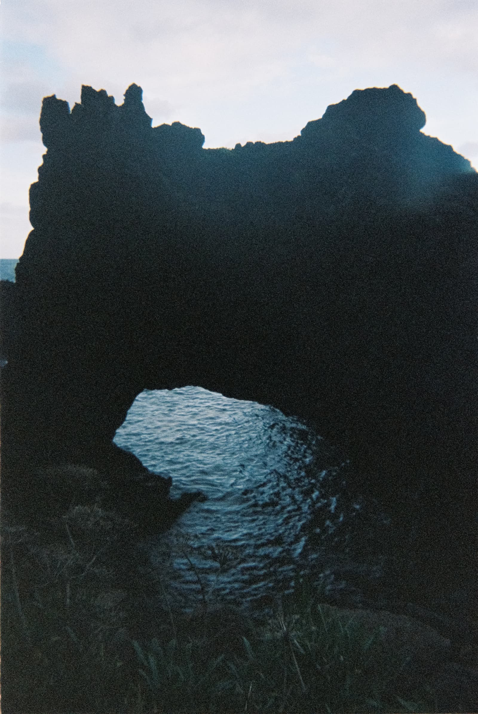 Moving water descending through rock and atmospheric light, catalog number 29, from the Falling Water collection