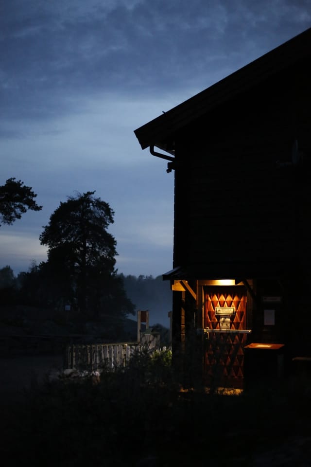 Low light across a darkened landscape and sky, catalog number 51, from The Quiet Dark collection