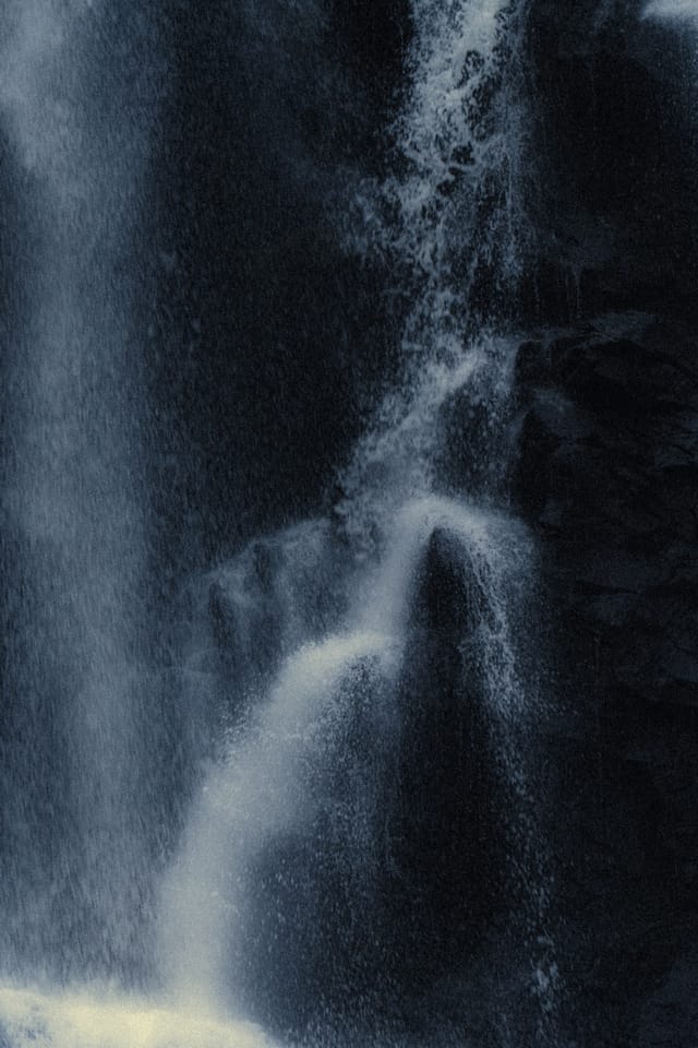 Moving water descending through rock and atmospheric light, catalog number 26, from the Falling Water collection
