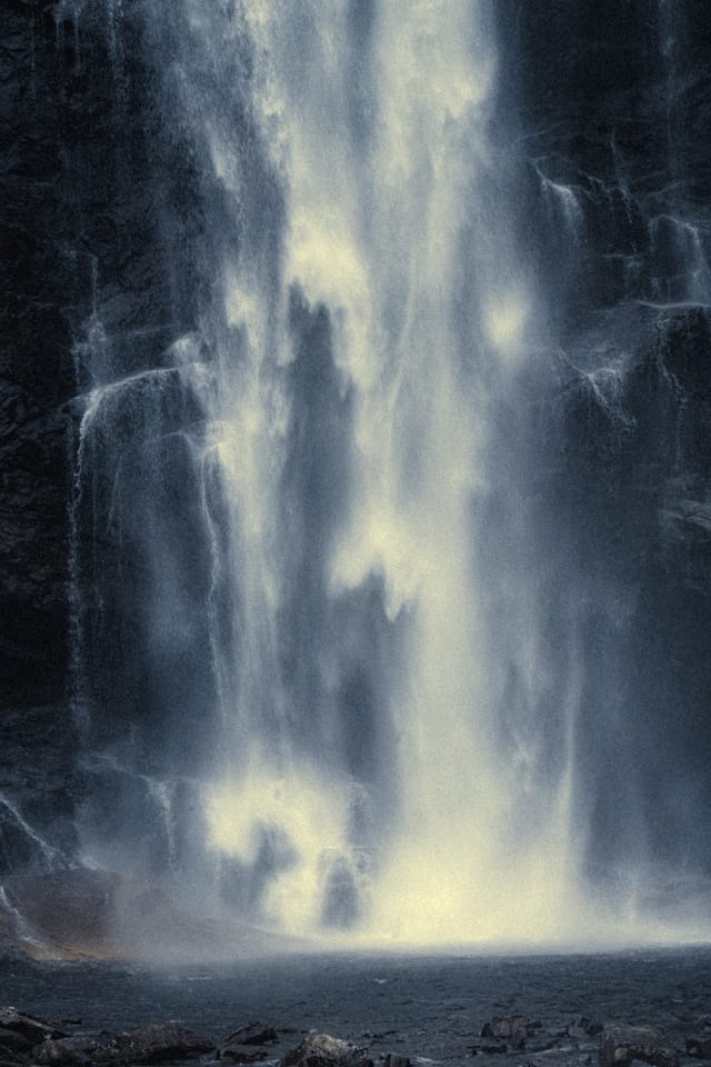 Moving water descending through rock and atmospheric light, catalog number 4, from the Falling Water collection