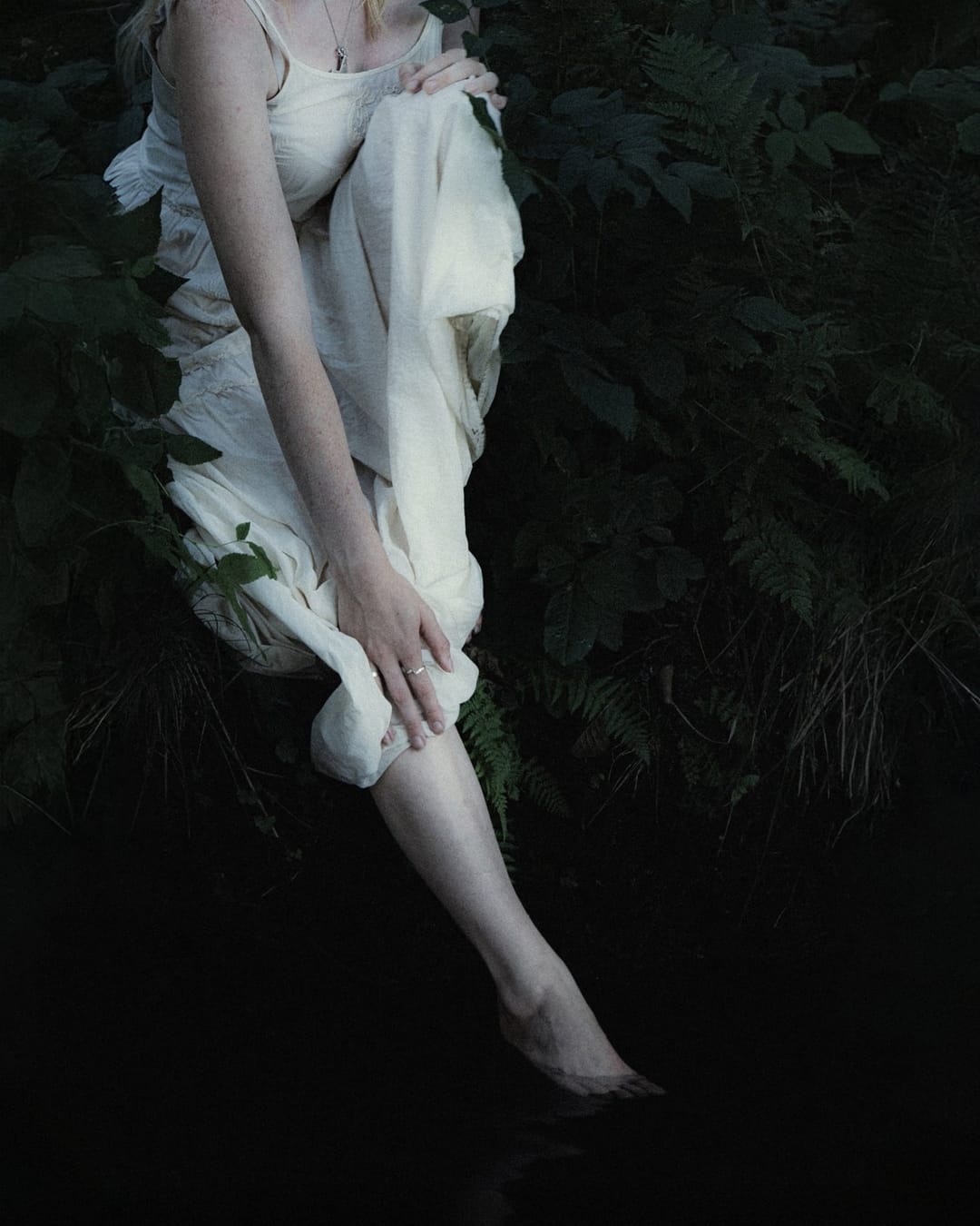 A resting body held among ferns and the forest floor, catalog number 17, from the Fernbed Body series