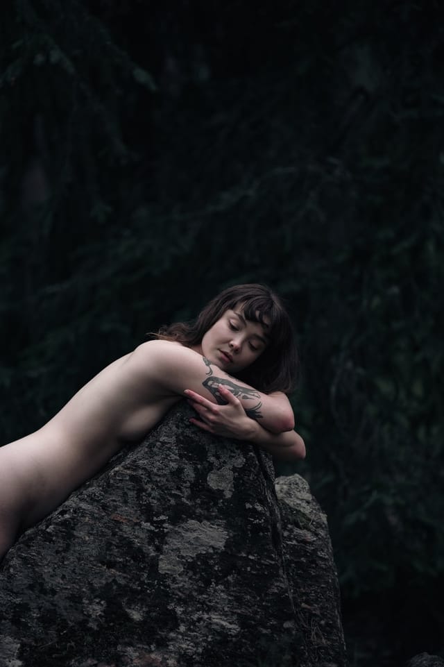 A resting body held among ferns and the forest floor, catalog number 1, from the Fernbed Body series