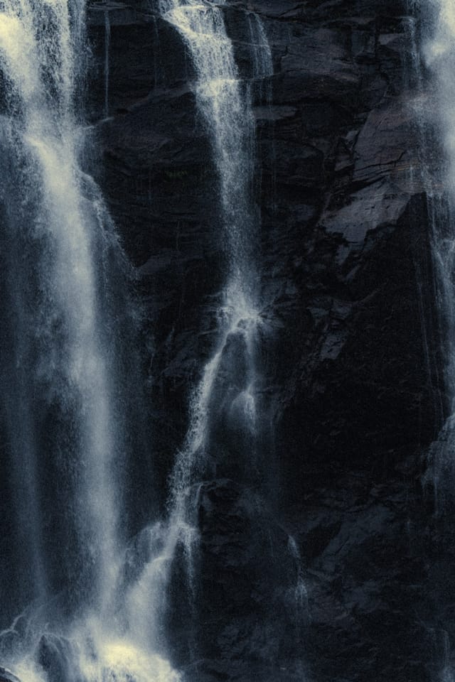 Moving water descending through rock and atmospheric light, catalog number 5, from the Falling Water collection