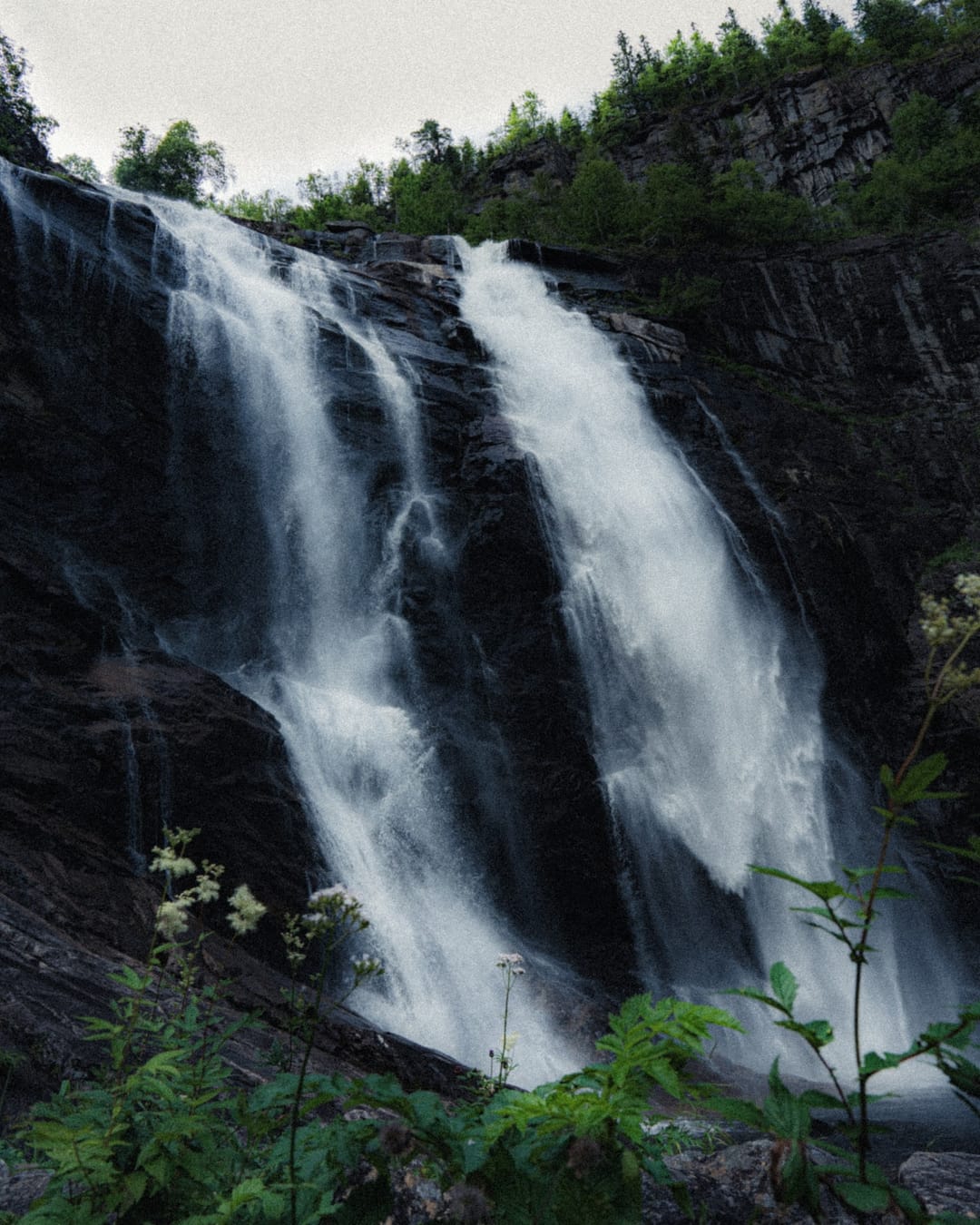 Moving water descending through rock and atmospheric light, catalog number 25, from the Falling Water collection