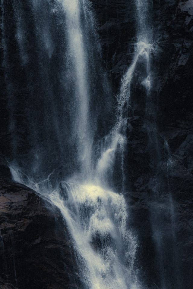 Moving water descending through rock and atmospheric light, catalog number 10, from the Falling Water collection