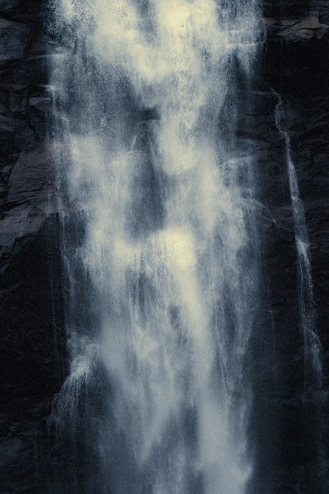Moving water descending through rock and atmospheric light, catalog number 7, from the Falling Water collection