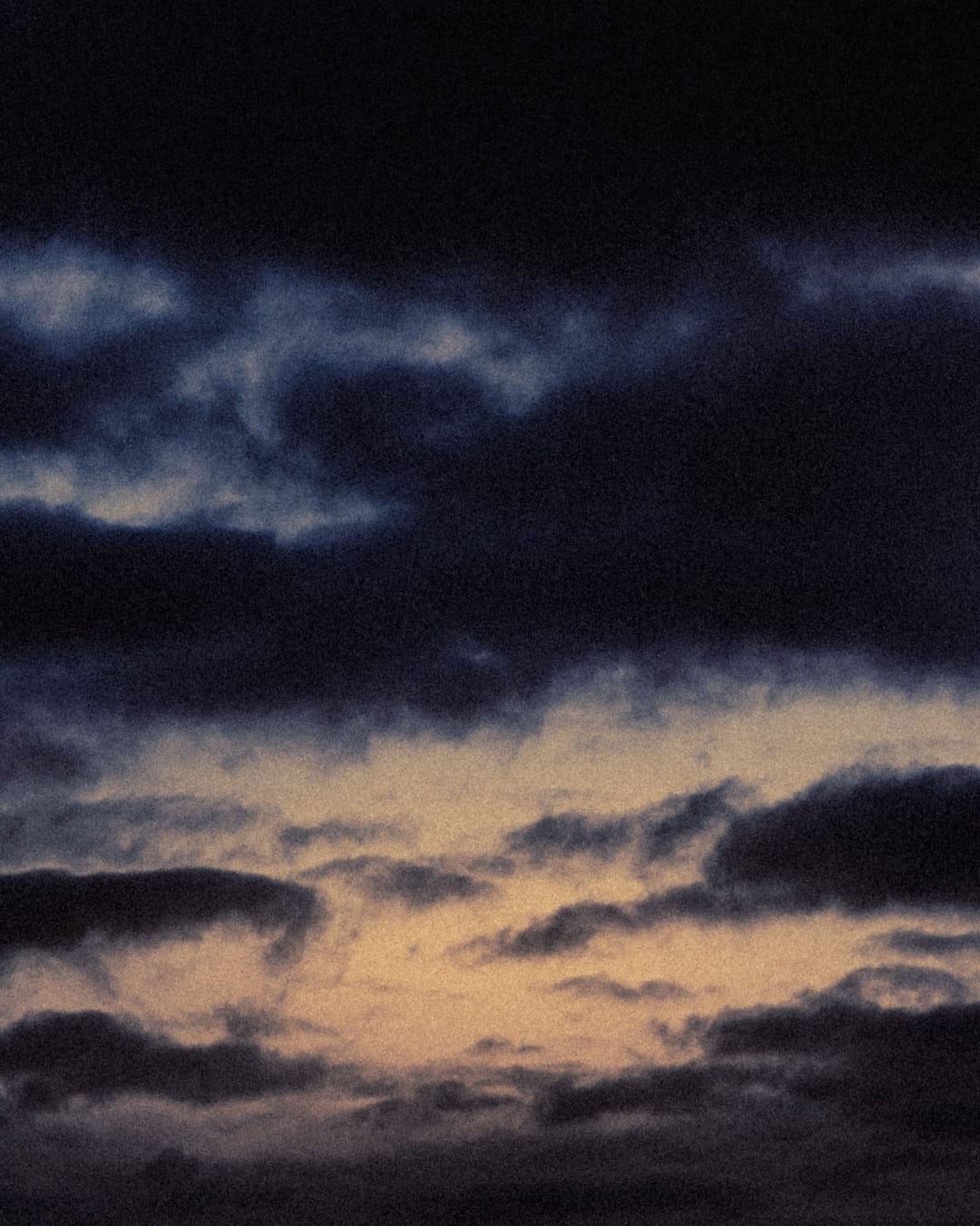 Low light across a darkened landscape and sky, catalog number 11, from The Quiet Dark collection