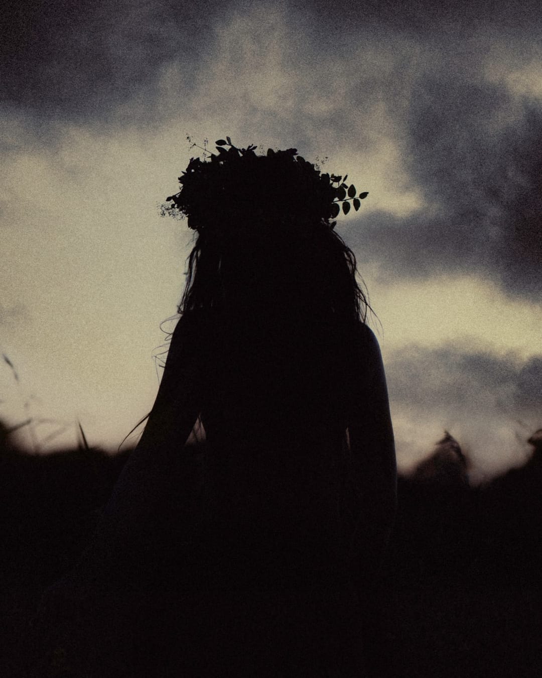 A human figure held in landscape, water or shadow, catalog number 19, from the Silent Figures collection