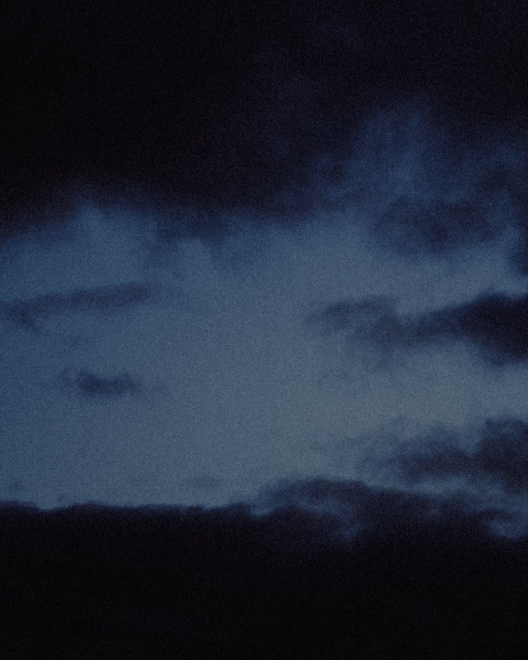 Low light across a darkened landscape and sky, catalog number 13, from The Quiet Dark collection