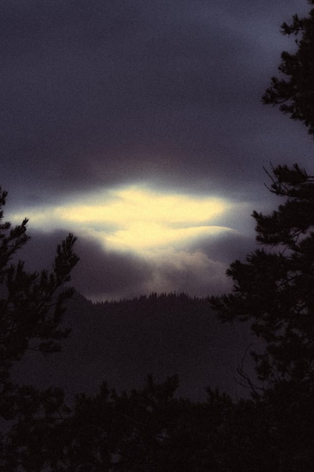 Low light across a darkened landscape and sky, catalog number 27, from The Quiet Dark collection