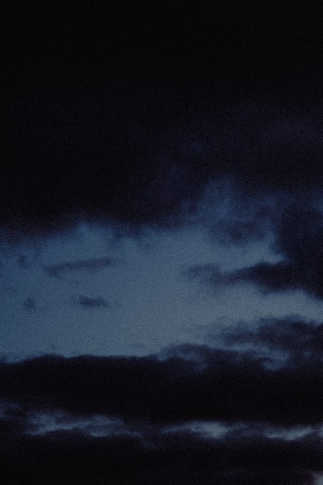 Low light across a darkened landscape and sky, catalog number 12, from The Quiet Dark collection