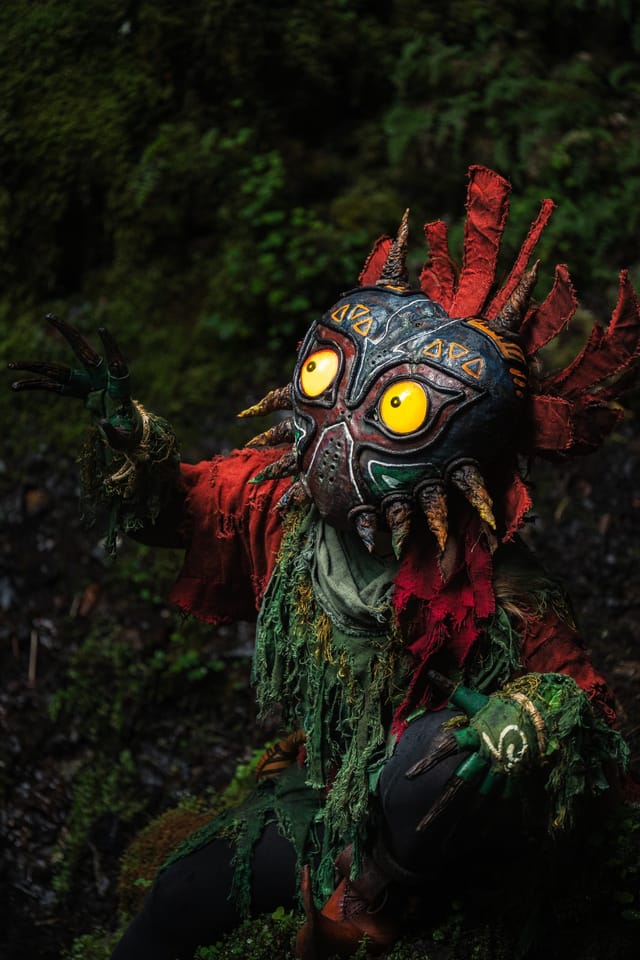 Skull Kid costume portrait among woodland shadows, selected work number 4